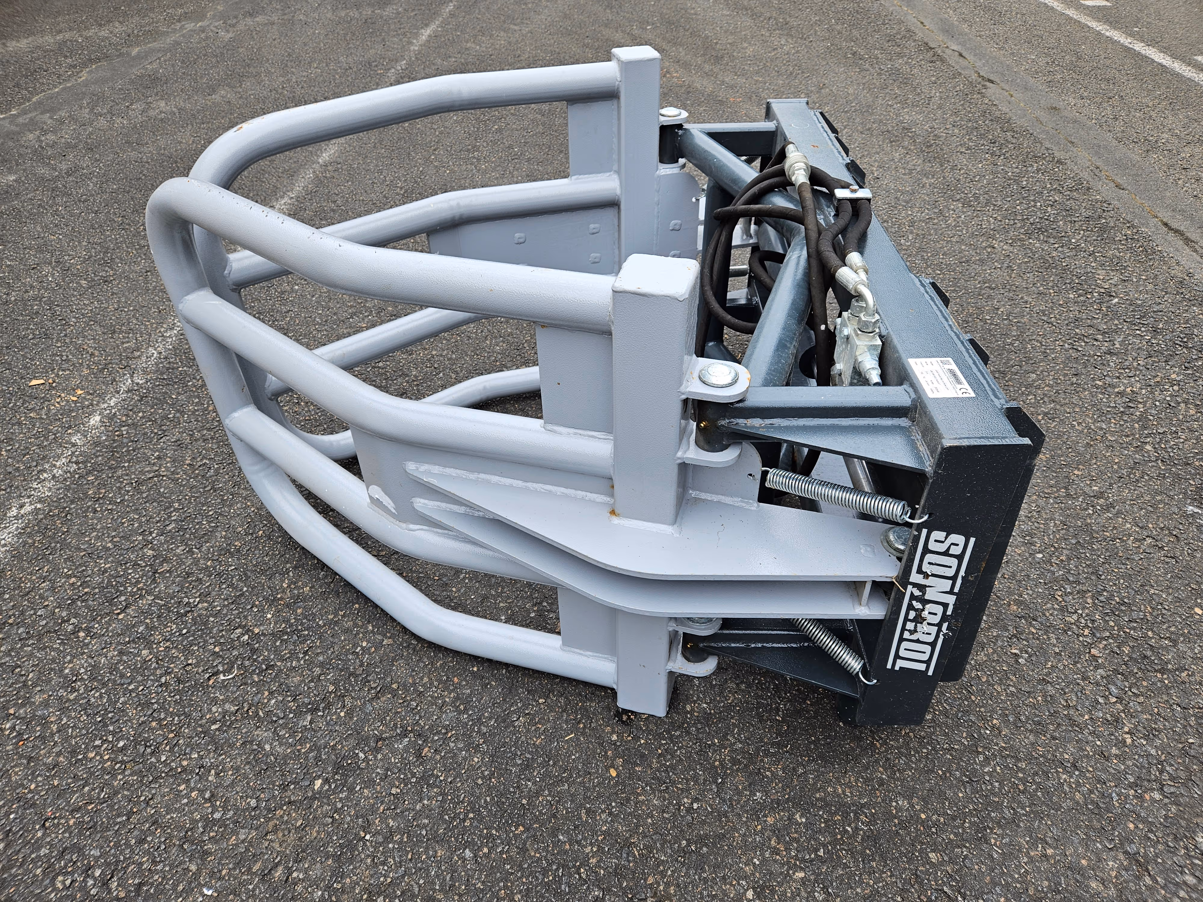 Pince à enrubannage 1500 attache Bobcat Maly Sonarol avec défauts