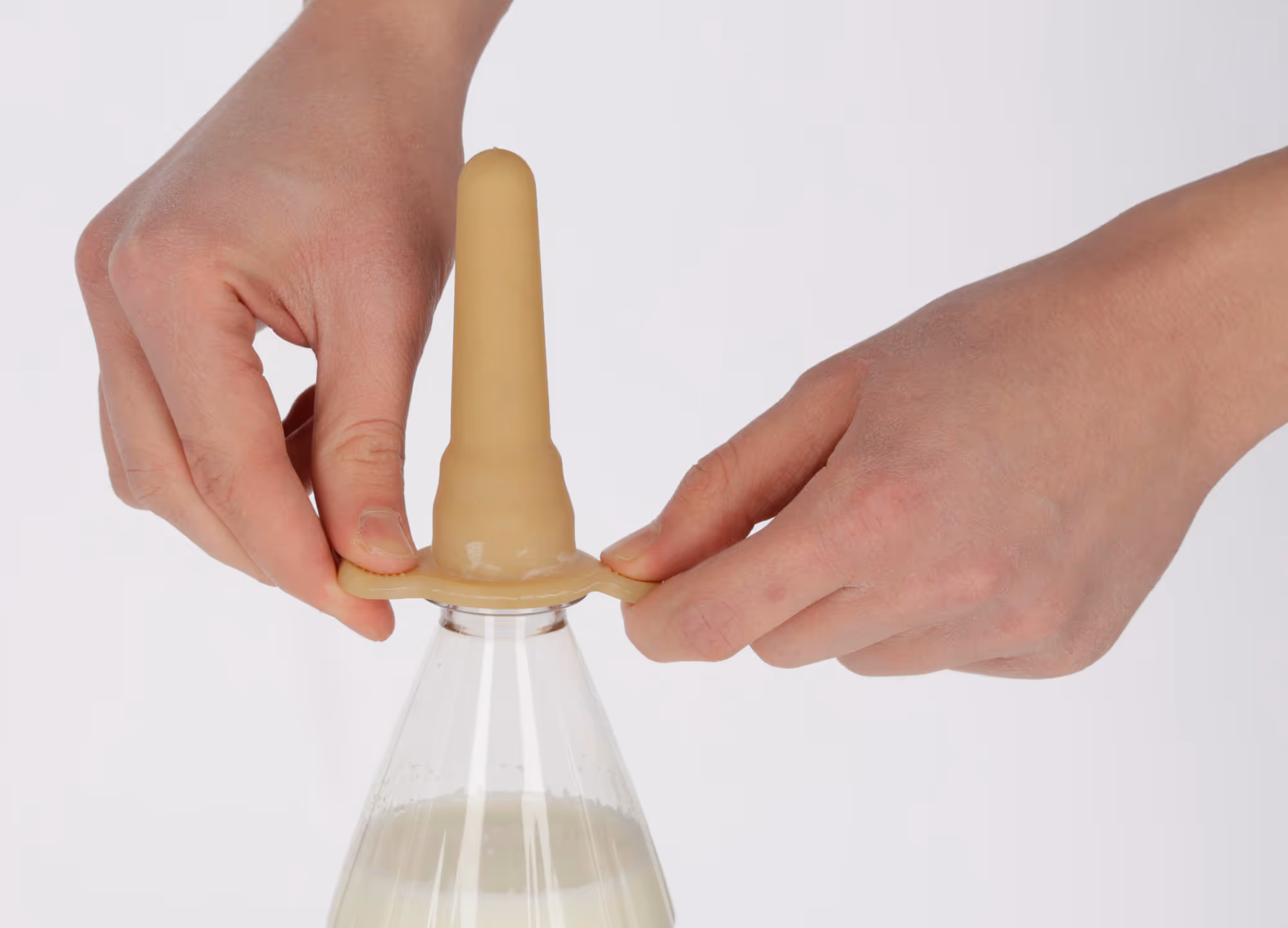 Tétine pour bouteille 